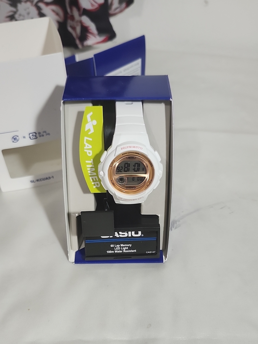 Casio White and Rose Gold Digital Sports Watch with Lap Timer